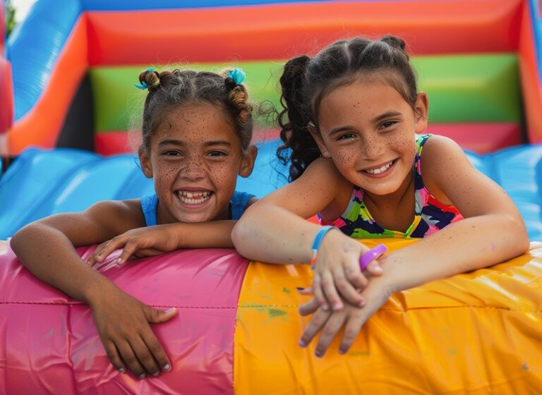 two-happy-children-relaxing-large-inflatable-bounce-house.jpg